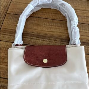 Longchamp ivory Tote with Brown Trim and Handles